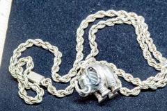 Helen Paddle jewelry silver necklace braid with round elephant pendant